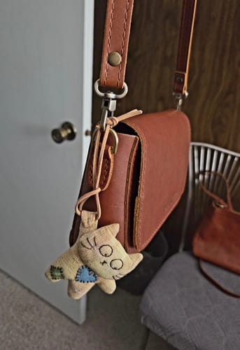 Customer photo review of Paw-Stuck Kitty Bag Charm