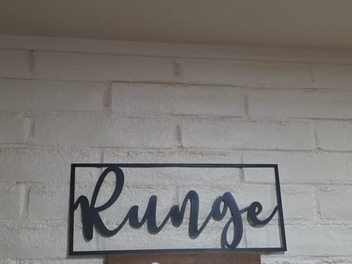 Customer photo review of What's in a Name Plaque - 3 Sizes - Personalized Metal Family Name Sign