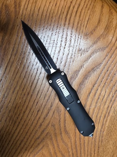 Customer photo review of Black Reaper OTF Knife