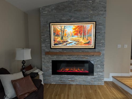 Customer photo review of Touchstone Sideline 60” Wall-Mount / Recessed Electric Fireplace