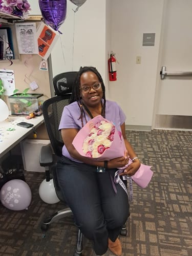 Customer photo review of Purple Tones Rose Bouquet