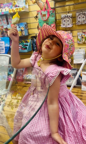 Customer photo review of PINK GINGHAM FLUTTER BUTTON DRESS