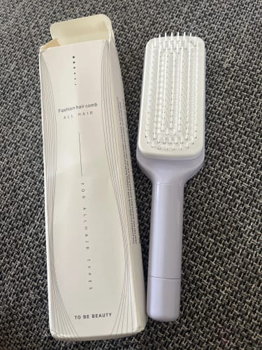 Customer photo review of SilkyBrush - Die innovative Haarbürste, die sich selbst reinigt