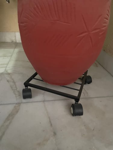 Customer photo review of United Crafts Rozy Wheel Pot Stands for Planters
