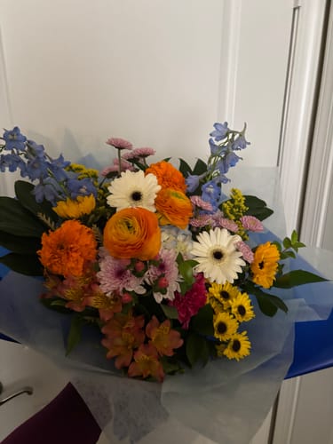 Customer photo review of Tote full of flowers