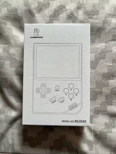 Reseña con foto de un cliente sobre Consola Retro Anbernic RG35XX
