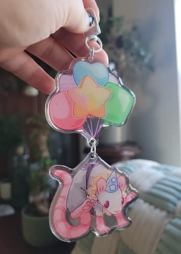 Customer photo review of Rat Party Balloon Clown Keychain!