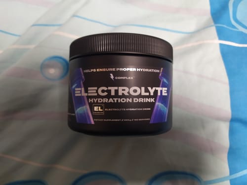 Zákaznická recenze s fotkou produktu Electrolyte Hydration Drink