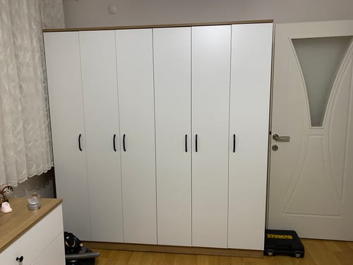 Customer photo review of Rani BA114 Geniş Gardırop Elbise Dolabı 6 Kapaklı 16 Raflı 2 Askılı Sepet Ceviz - Beyaz