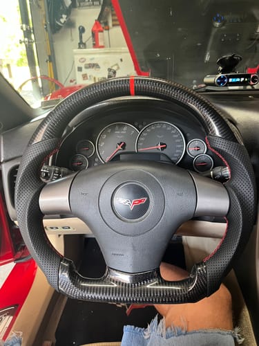 Customer photo review of Genuine Carbon Fiber Steering Wheel With Button Trim For C6 Corvette 2006-2011