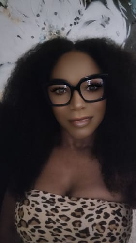 Customer photo review of CurlyMe Pre-bleached Wear Go Glueless Afro Kinky Curly Pre-cut HD Lace Wig Pre-plucked