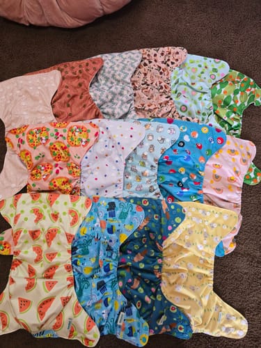 Customer photo review of Floral: Essentials Pocket Cloth Diaper with Athletic Wicking Jersey, Grows with your Baby