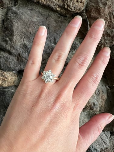 Lauren M. review of Doveggs flower shape round moissanite engagement ring image 1 out of 1