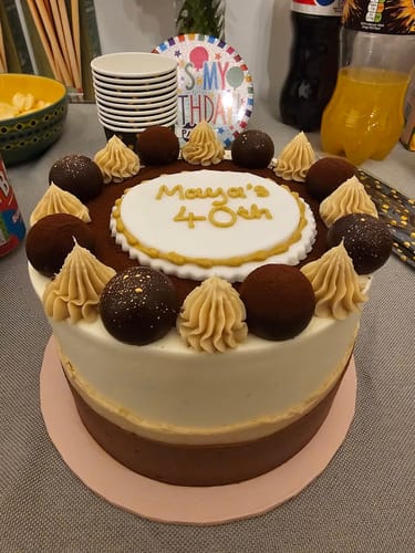 Customer photo review of Tiramisu Cake