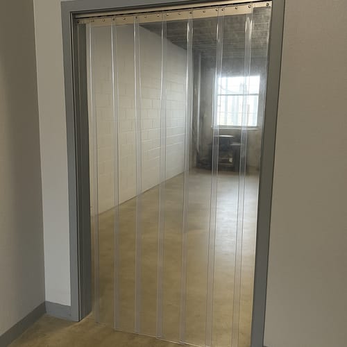 Customer photo review of Department Entrance PVC Strip Curtains (Hook On) - Energy-Saving, Clear, Flexible, Noise-Reducing Curtain Kit with Stainless Steel Rails for Doorways