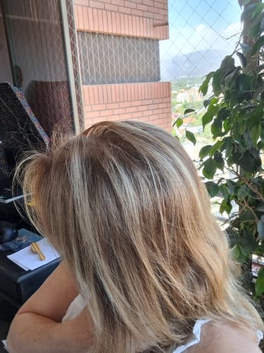 Reseña con foto de un cliente sobre Spray Bifásico 10 en 1 230 ml