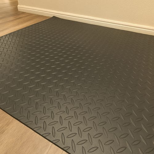 Customer photo review of Heavy Duty Diamond Tread Garage Flooring - High Quality PVC Rubber, Anti-Fatigue, Oil & Chemical Resistant, Easy Install, Cushioned, Seamless Look