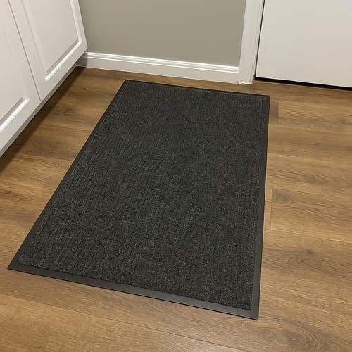 Customer photo review of Heavy Duty Non-Slip Kitchen Barrier Mat - Rubber Backed Hallway & Door Rug for High Traffic Areas