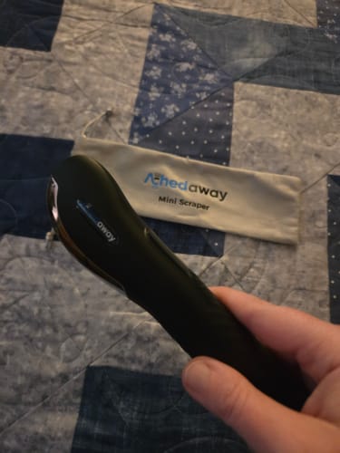 Customer photo review of Achedaway Mini Scraper:On-the-Go heated muscle scraping tool