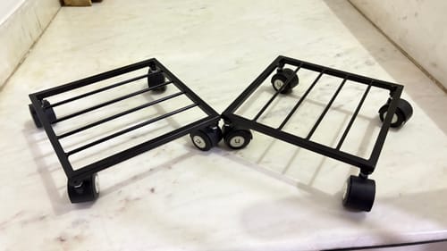 Customer photo review of United Crafts Rozy Wheel Pot Stands for Planters