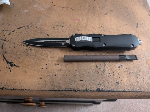 Customer photo review of Black Reaper OTF Knife