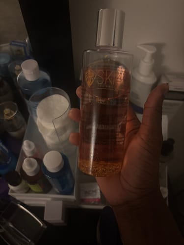 Customer photo review of 24K Gold Skin Brightening Body Oil