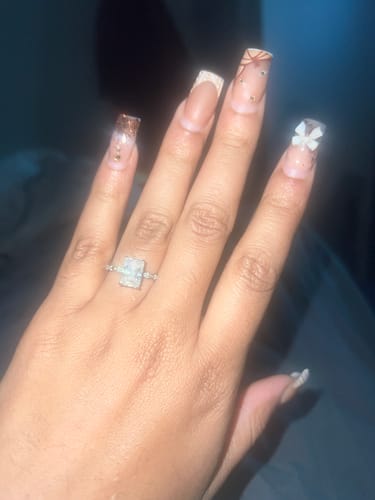 Customer photo review of Erica 3 Carat Radiant With Side Stones and Hidden Halo Moissanite Engagement Ring in 14k White Gold
