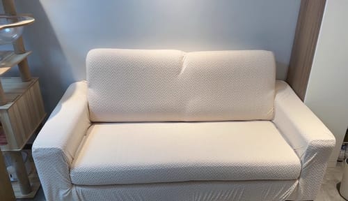 Customer photo review of Stretch Sofa Cover - Washable Slipcover for Couch, Non-Slip Elastic Furniture Protector - Pet & Kid-Friendly
