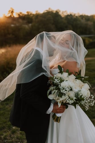 Customer photo review of Raw Edge Cascade Veil: Fingertip to Cathedral Length - PORTIA