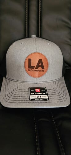 Customer photo review of Custom Leather Patch Trucker Hat - Richardson 112
