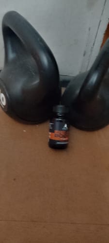 Reseña con foto de un cliente sobre EREBOOST | 60 Cápsulas