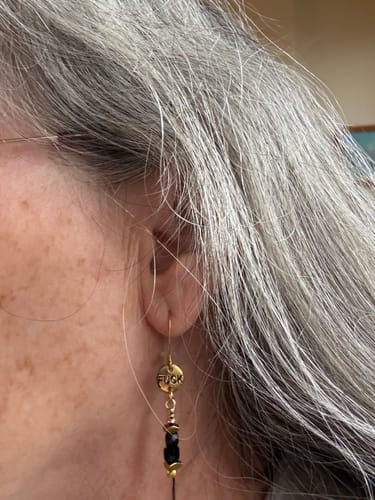 Customer photo review of Stamped F*ck Drop Earrings with Delicate Gemstone Chain