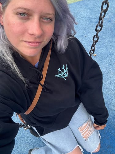 Customer photo review of Drippy Smiley Vybes Hoodie