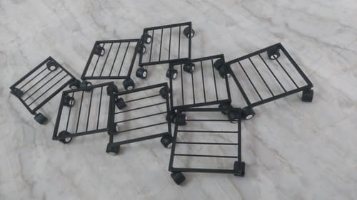 Customer photo review of United Crafts Rozy Wheel Pot Stands for Planters
