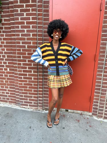 Customer photo review of Plaid Pleated Mini Skirts