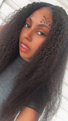 Customer photo review of CurlyMe Kinky Curly Virgin Human Hair 3 Bundles With 4x4 Closure Natural Black