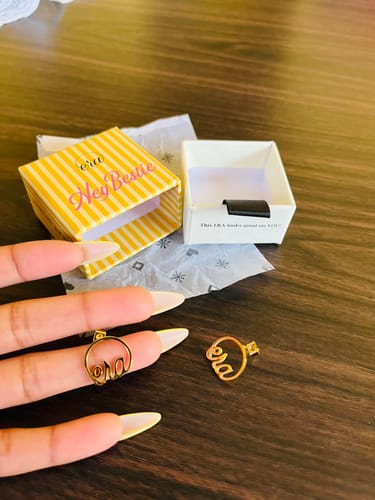 Customer photo review of Gold Era Logo Studs