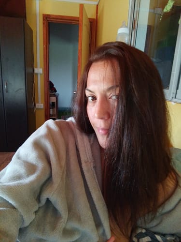 Reseña con foto de un cliente sobre Preventa Serum Antifrizz 60 ml