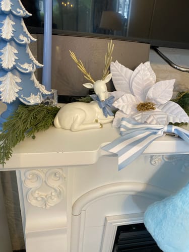 Customer photo review of Sitting White Reindeer with Blue Bow (Set of 2)