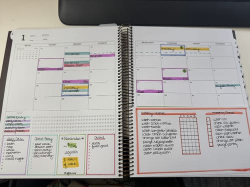 Customer's Scout Planner, open to a monthly spread filled with handwritten notes and highlighted appointments.