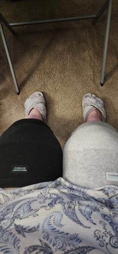 Reviewer's legs, each wearing a Premium Bamboo Knee Sleeve; one is black and one is light gray.