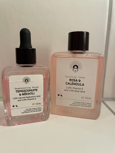 Customer's Barrier Protection Routine products, the pink Regenerating Serum and Soothing Toner, on a counter.