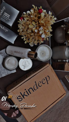 Customer's elegant flat lay of Dream Cream products, including the open jar, bottle, and packaging.