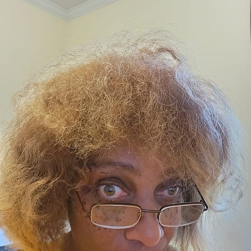 Close-up of a reviewer's blonde hair after using the Instant Dye Shampoo.