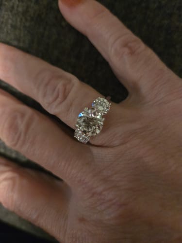 Customer photo review of Iara 3.5 Carat Round Three Stone Lab Grown Engagement Ring in Platinum