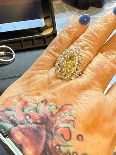 Customer photo review of 7.10 Carats Lab Grown Pear Shaped Fancy Yellow High Jewelry Diamond Engagement Ring