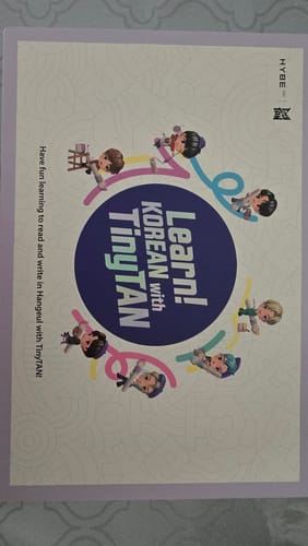 Customer's photo of the 'Learn! Korean with TinyTAN' packaging, showing the title circled by cute cartoon characters.