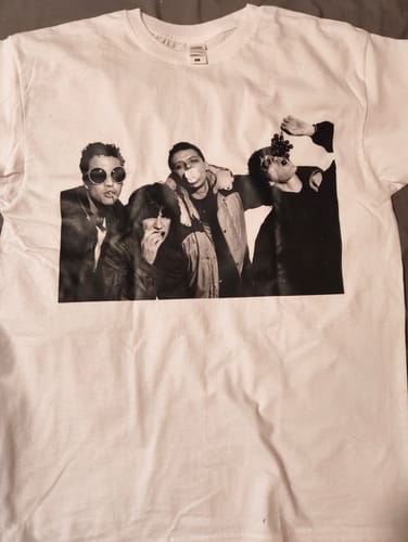 Customer's white heavyweight t-shirt laid flat, featuring a custom black-and-white photo print on the front.