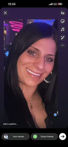 Reviewer showing off a confident smile with her new Pop On Veneers.