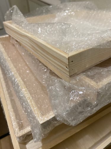 Customer photo review of 18" x 18" Solid Reusable Wooden Tray With Lids